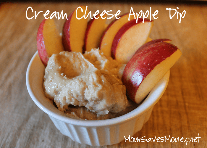 Cream cheese dip in bowl with sliced apples