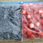 flash frozen blueberries and strawberries in a freezer bag