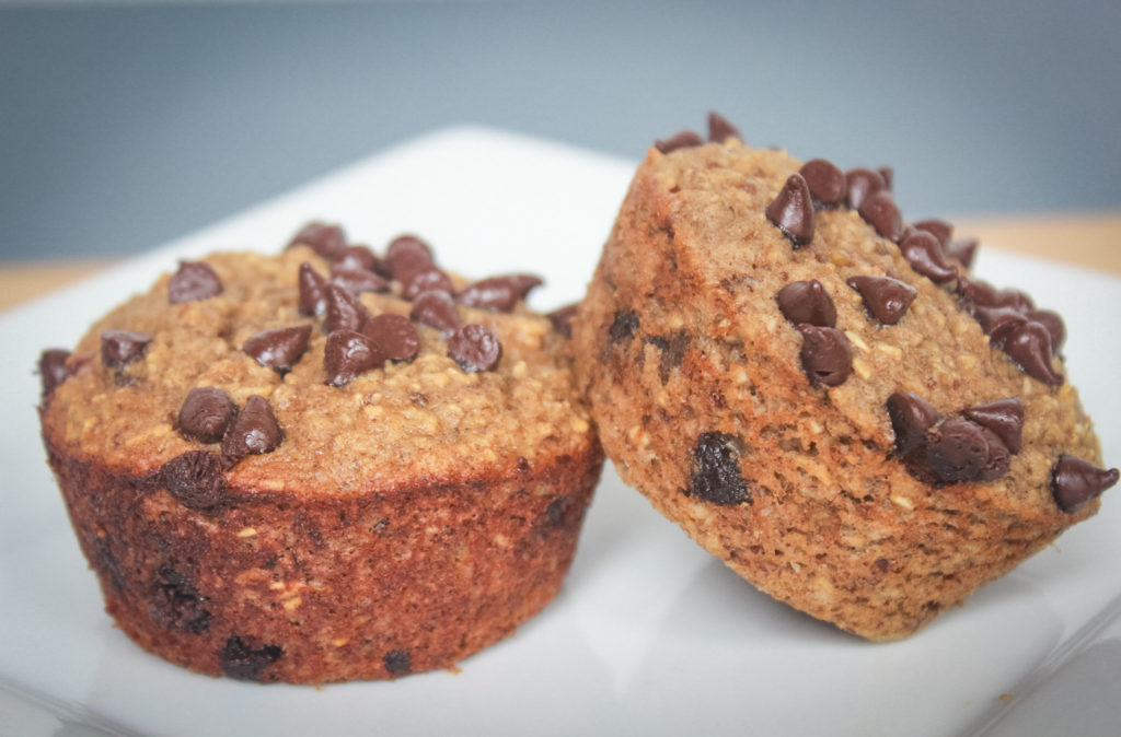 chocolate chip banana oatmeal muffin on white plate