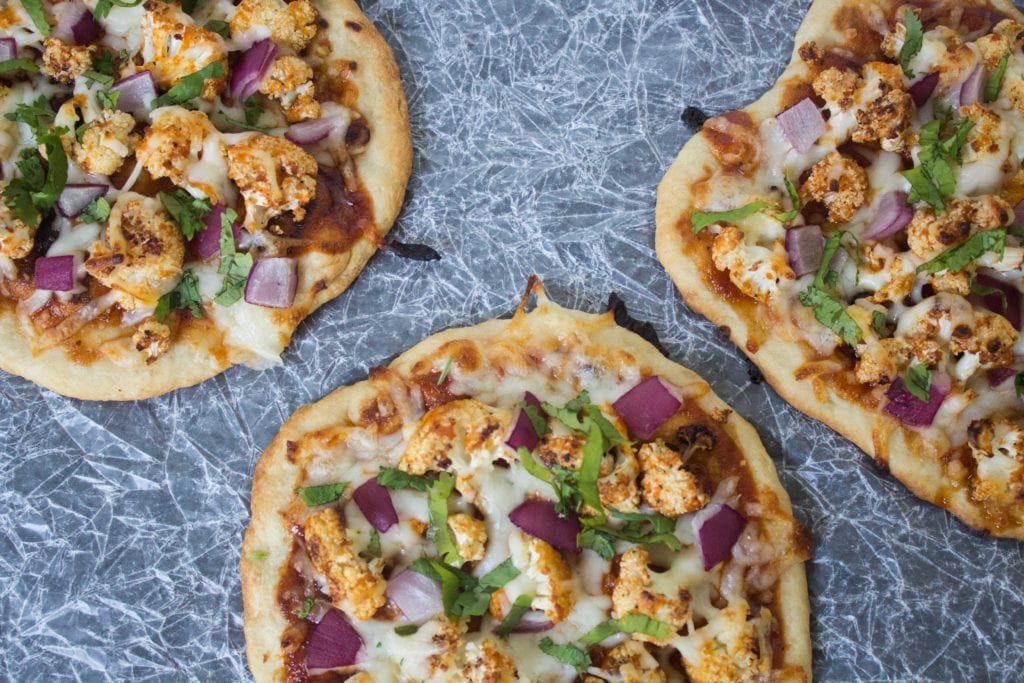 Three bbq cauliflower pizzas