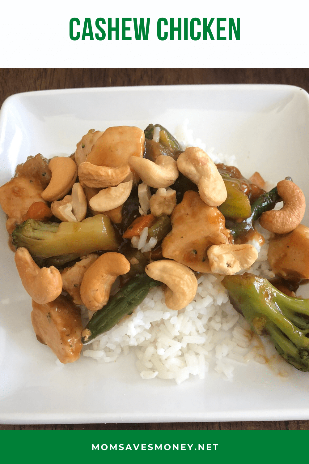 cashew chicken over rice on white plate