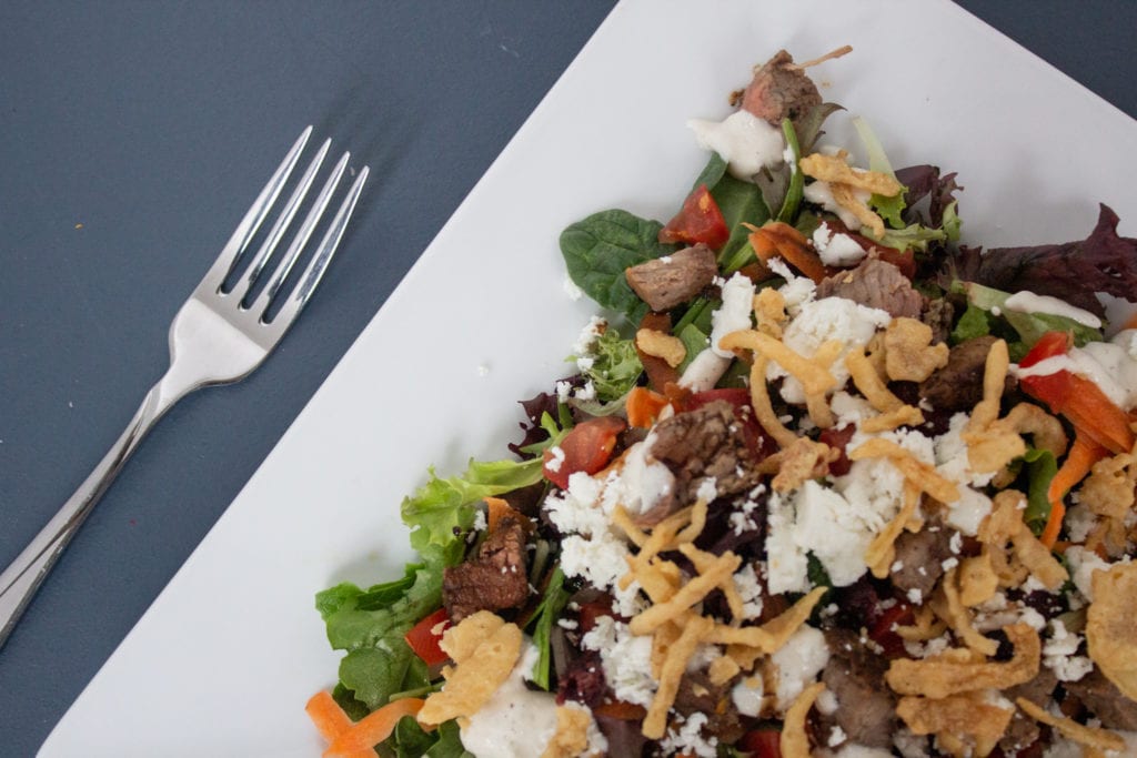 balsamic steak salad plated