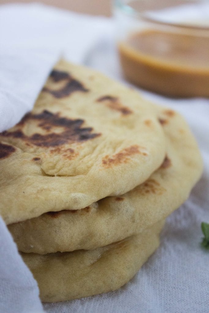 Naan bread wrapped in towel