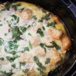 Easy egg, cheese, ham, and spinach casserole made in the crock pot