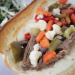 Hot Italian beef sandwiches with provolone cheese and Giardiniera