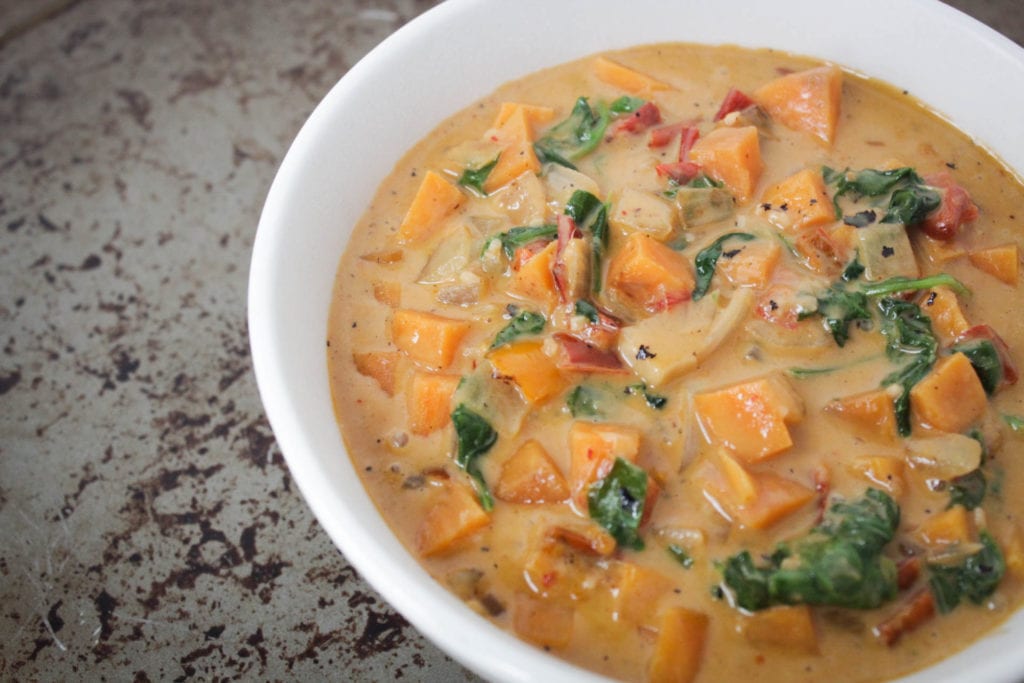 Easy and delicious sweet potato curry with spinach, coconut milk and red curry paste ready in just 40 minutes