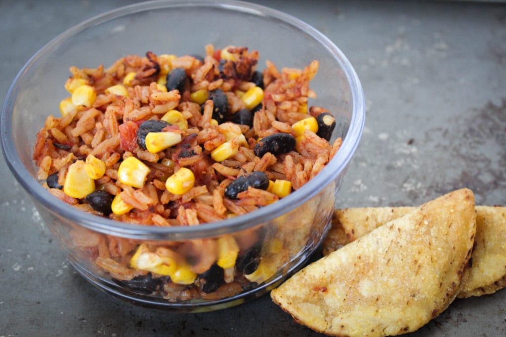 Homemade spanish rice with a blend of flavorful seasonings, corn, tomatoes, diced green chiles and black beans. Serve with your favorite Mexican dishes