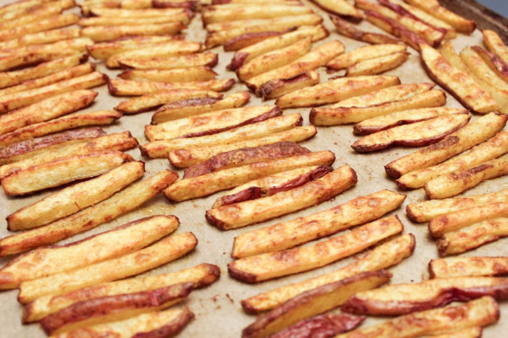 Homemade curry fries with curry powder and coriander