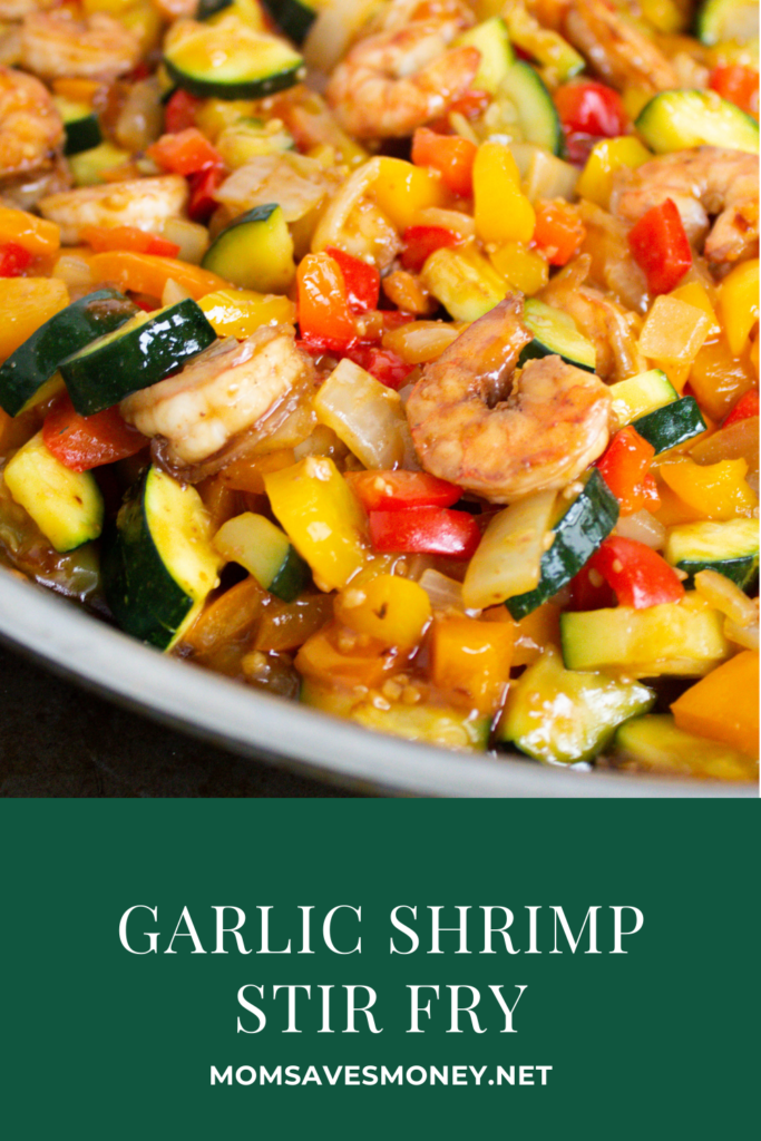 Shrimp stir fry with bell peppers, zucchini and onion in a homemade garlic sauce