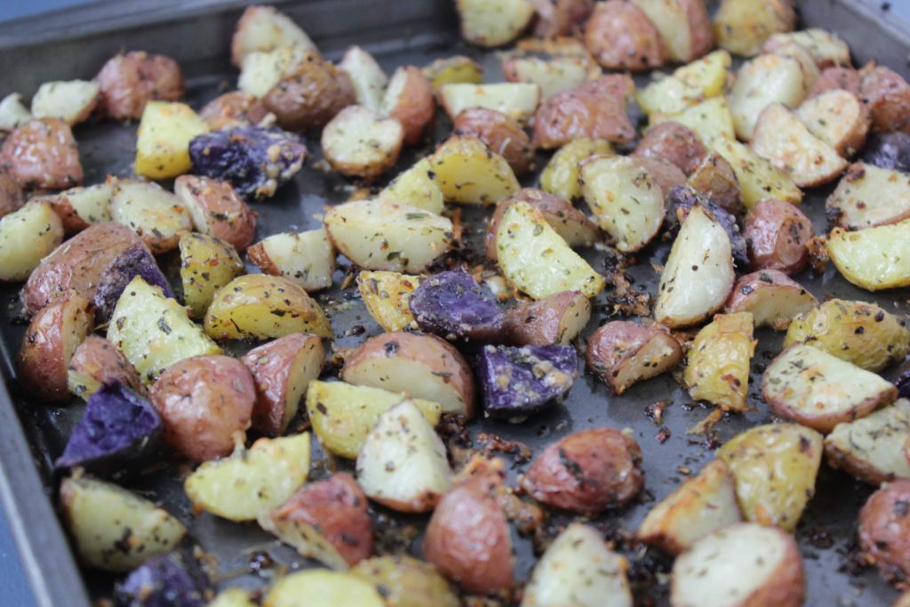 roasted baby potatoes on a baking sheet