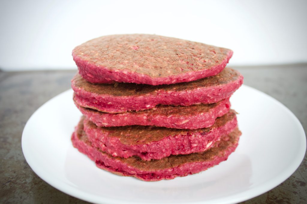 stack of 5 beet pancakes on plate