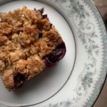 Plate with slice of gluten-free blueberry rhubarb crisp