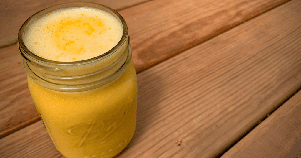 iced golden milk latte in a mason jar