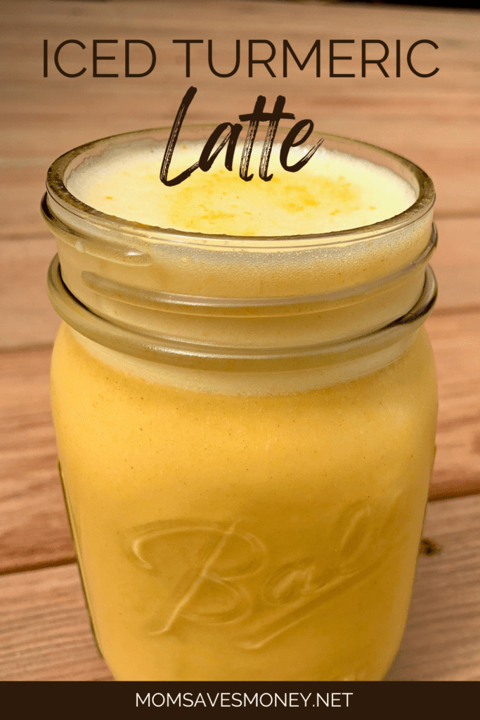 Iced golde milk turmeric latte in a mason jar