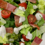salad with bacon, tomatoes, and ranch dressing.