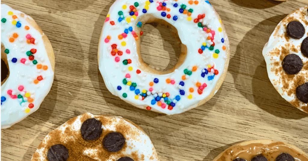 Apple rings with frosting and sprinkles